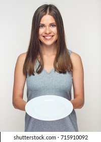 Woman Holding White Plate. Smiling Girl Waitress Isolated.