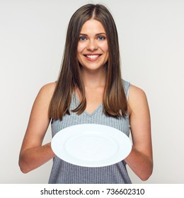 Woman Holding White Plate. Smiling Girl Waitress Isolated.