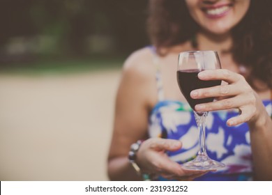 Woman Holding A Wine Glass.