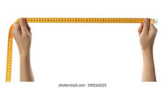 Woman holding yellow measuring tape on white background, closeup - Shutterstock ID 1902162121