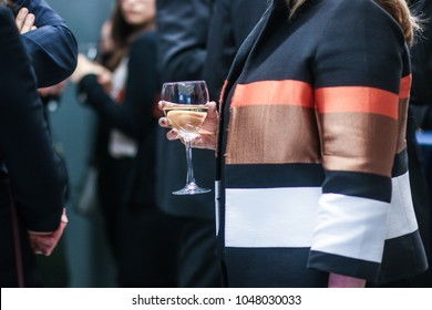 A Woman Holds A Glass Of Wine At A Corporate Networking Event In Washington, D.C.