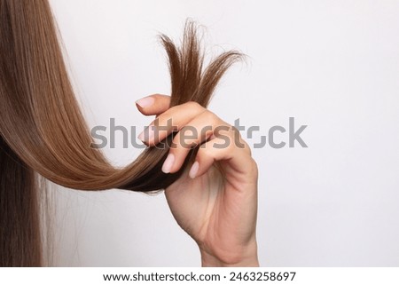 Similar – Image, Stock Photo Woman with strand of hair