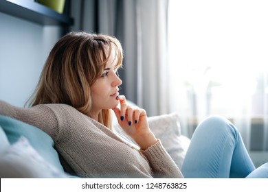 Woman At Home Deep In Thoughts Thinking And Planning