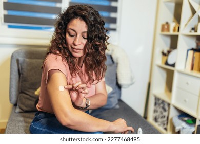 Woman at home using products for hormone replacement therapy. - Shutterstock ID 2277468495