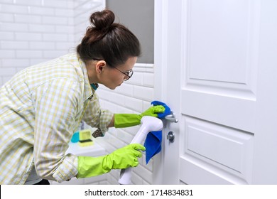 Woman Housewife Doing House Cleaning In Bathroom, Female Washing Door With Shower Steam. Using Steam Cleaner For Quick Cleaning