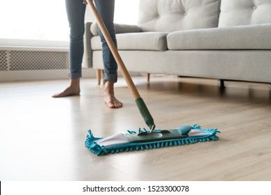 Woman Housewife Wash Wooden Laminate Floor In Modern Living Room, Female Cleaner Housekeeper Maid Holding Mop Cleaning At Home, Domestic Housework Professional Household Service Concept Close Up View 