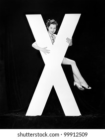 Woman With Huge Letter X