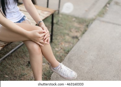 Woman Hugged Her Kneesgirl Sit With Ones Legs Crossedwaiting And Relaxing Concept Woman Hugged Her Kneesgirl Sit With Ones Legs Crossedwaiting And Relaxing Concept