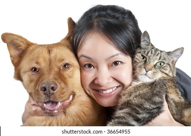 Woman Hugging Her Dog And Cat