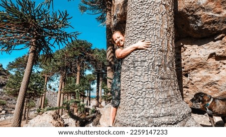 woman hugging tree. love nature, happiness, summer