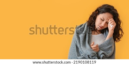 Woman ill with flu on yellow background with space for text