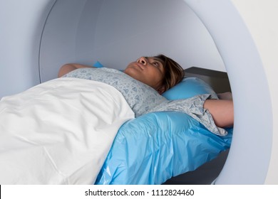 Woman In Immobilization Device Receiving Radiation Therapy Treatments For Breast Cancer