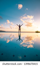 Woman At Infinity Pool During Vacation St Lucia Caribbean, Sunset By The Swimming Pool