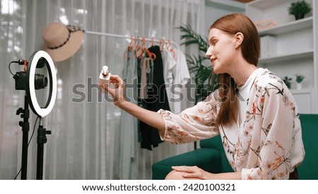 Woman influencer shoot live streaming vlog video review skincare for prim social media or blog. Happy young girl with cosmetics studio lighting for marketing recording session broadcasting online. Stock foto © 