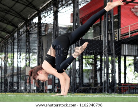 Woman insportswear practicing yoga
