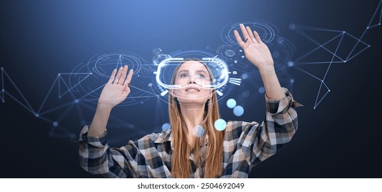 Woman interacting with a virtual interface while wearing VR headset, dark background, concept of augmented reality and digital technology