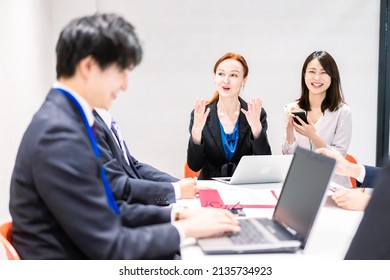 A Woman Interpreting At An International Conference