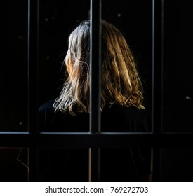 Woman In A Jail