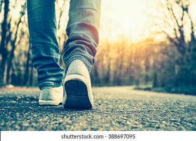 Woman jeans and sneaker shoes - Shutterstock ID 388697095