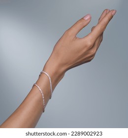 Woman Jewelery concept. Woman s hands close up wearing rings and necklace modern accessories elegant life style with copy space for text and background. - Shutterstock ID 2289002923