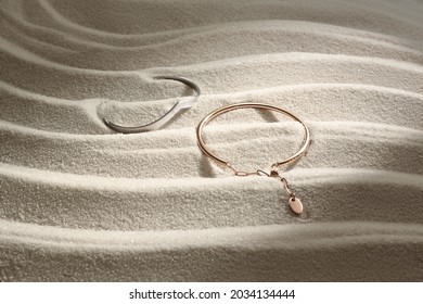 woman jewelry bracelet white sand and moody sunset lighting