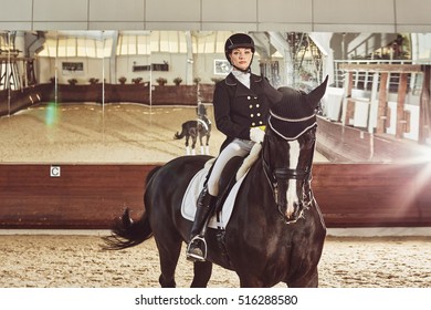 Woman Jockey With His Horse