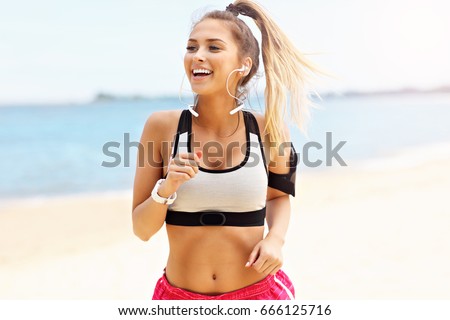 Woman jogging on the beach