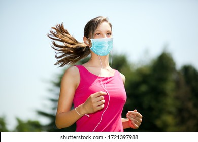 Woman Jogging At The Park Wearing A Mask, Coronavirus Concept