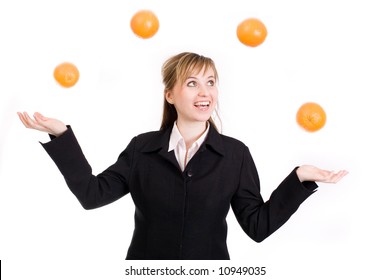 Woman Juggling With Oranges / Multitasking