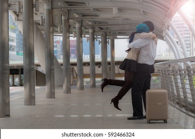 Woman Jump And Hug Her Husband In The Airport