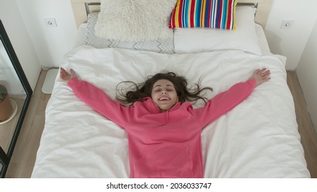 Woman Jumping Or Falling On Bed