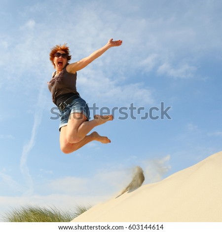 woman jumping for joy/jumping for joy/ woman jumping for joy Stock photo © 