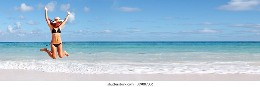 Woman Jumping On The Beach