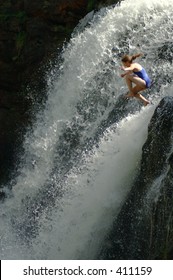 Woman Jumping Waterfall