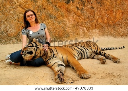 woman with Kanchanaburi temple tour tiger thailand