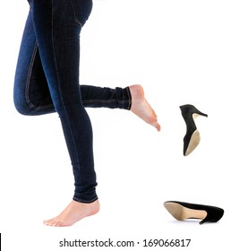 Woman Kick Off Her Shoes With White Background