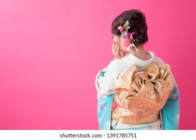 Woman In A Kimono(The Girls Prepare A Kimono Known As Furisode For Their Coming Of Age Ceremony.)