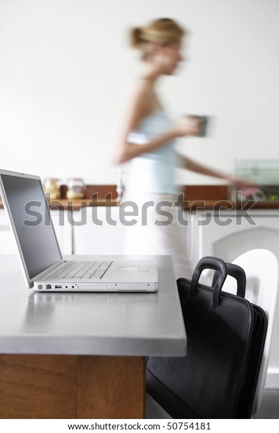 Woman Kitchen Walking By Laptop Focus Stock Photo Edit Now 50754181