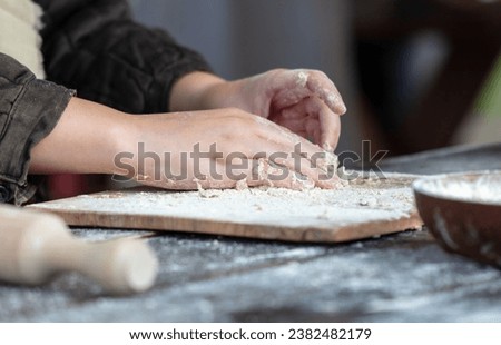 Similar – Foto Bild Frau beim Kneten von handwerklichem Brot auf Holztisch