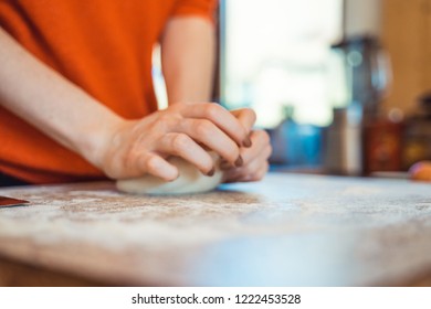 Woman Kneeding Dough