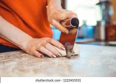 Woman Kneeding Dough