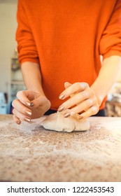 Woman Kneeding Dough