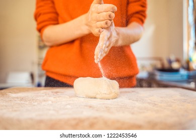 Woman Kneeding Dough