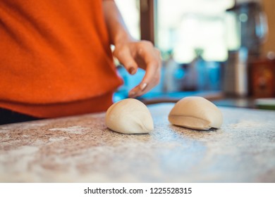 Woman Kneeding Dough