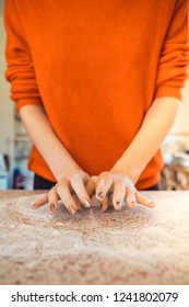 Woman Kneeding Dough