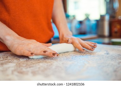 Woman Kneeding Dough