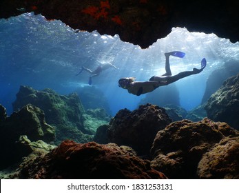 Woman Lady Free Diving Apnea Underwater Cave Sun Beams And Rays Ocean Scenery With Human