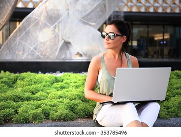 Woman With Laptop Outdoor