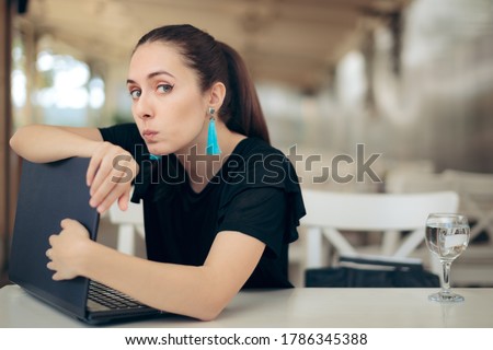 Woman with Laptop Worried About Online Privacy of Personal Data. Girl trying to keep her internet data confidential typing password in secret
