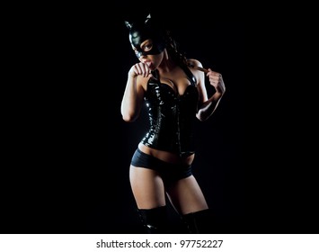 Woman In Latex And Leather Black Cat Costume